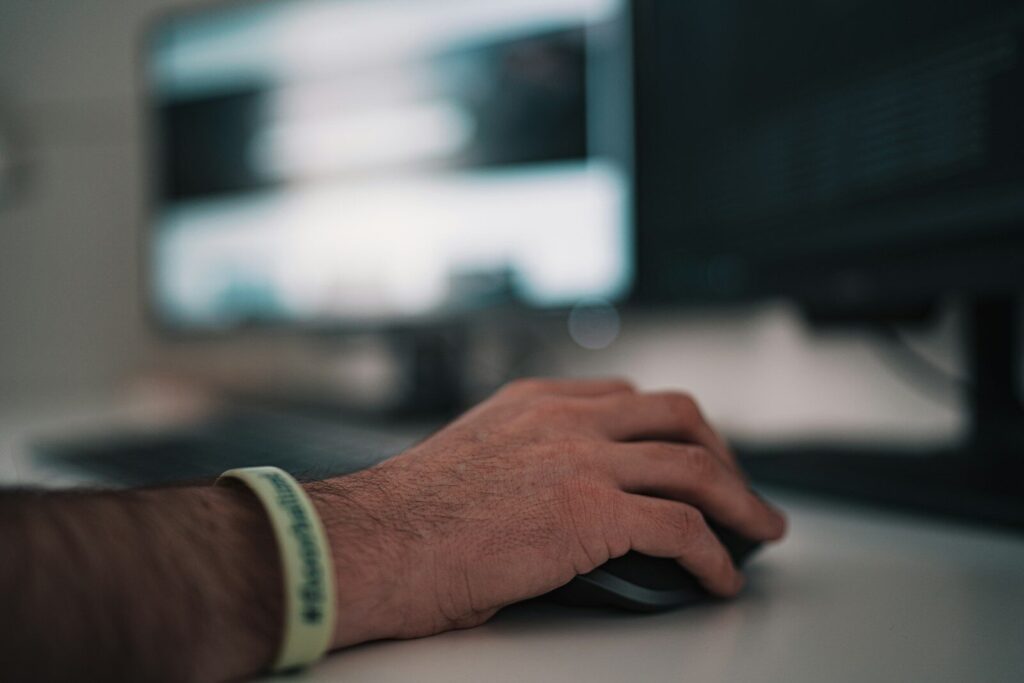 a person using a computer mouse
