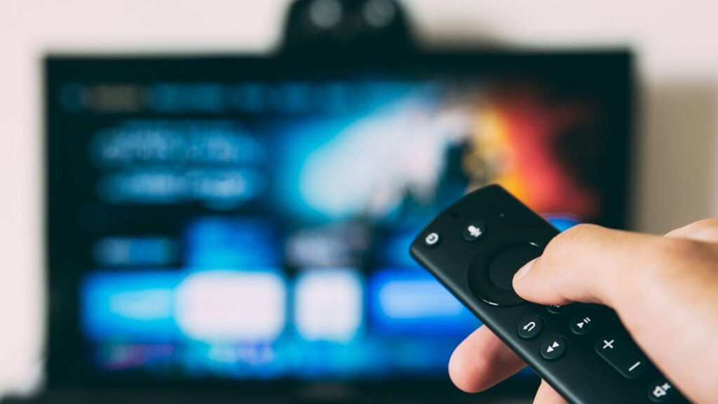 turned-on flat screen television