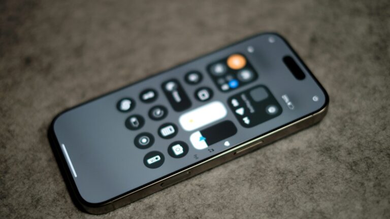 A close up of a remote control on a table