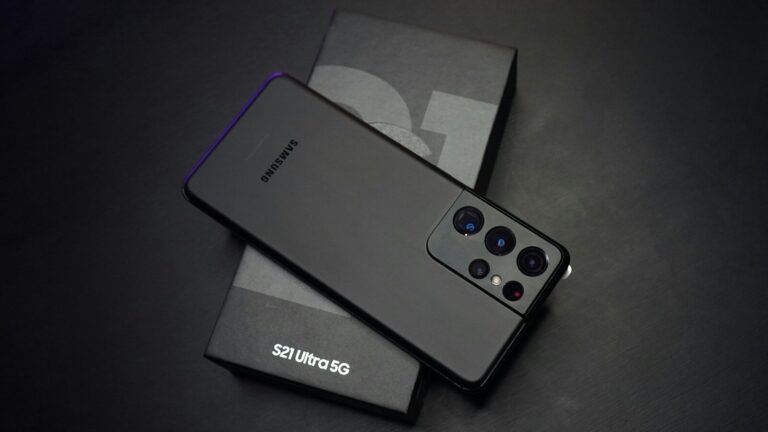 black sony remote control beside white tissue paper