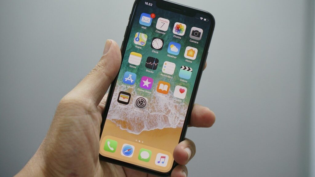 person holding space gray iPhone 7
