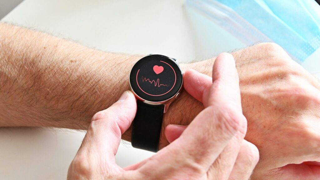a person holding a stopwatch