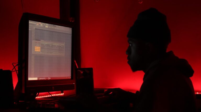 man in front of monitor