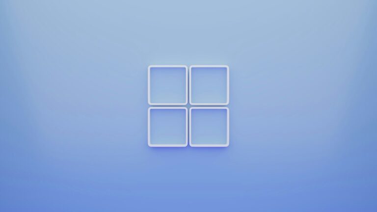 Four white square frames arranged in a grid on a soft blue background
