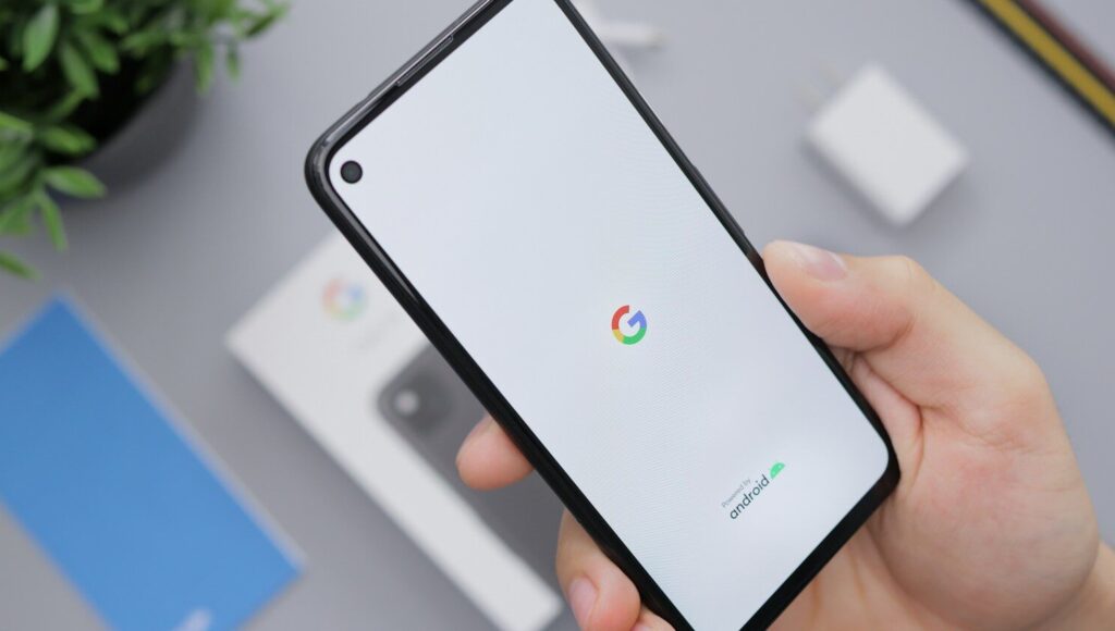 person holding black android smartphone