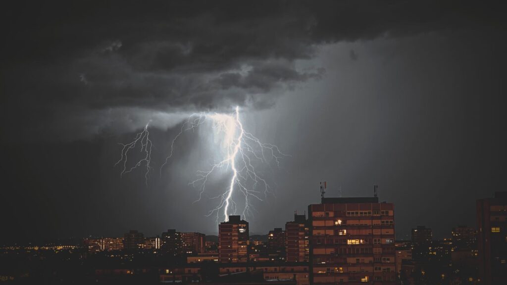 Stunning night view of a lightning storm illuminating the skyline of Zagreb, Croatia.