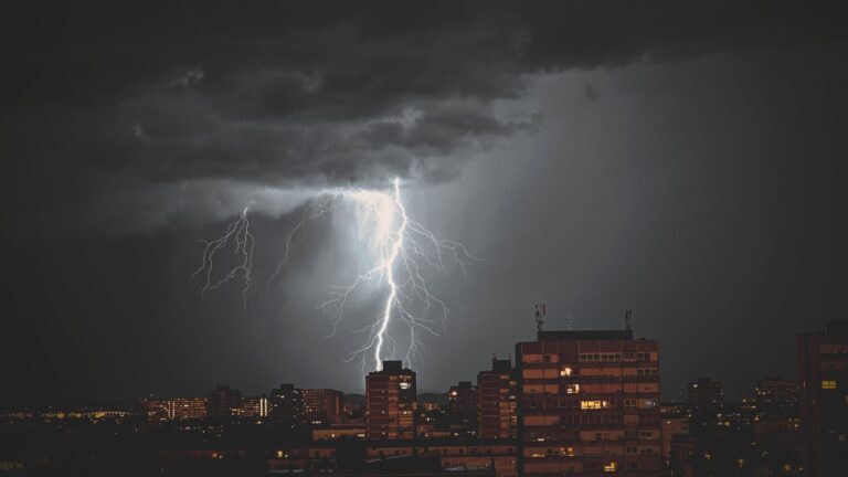 Stunning night view of a lightning storm illuminating the skyline of Zagreb, Croatia.