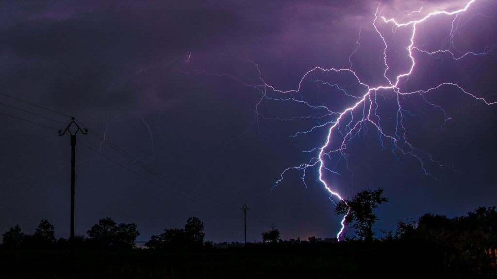 A stunning lightning strike captured during a thunderstorm in Flavin, Occitanie, France.