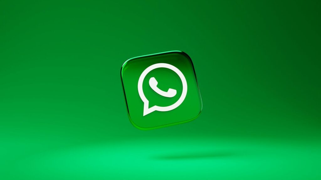 A glossy green square icon with a white telephone handset inside a speech bubble